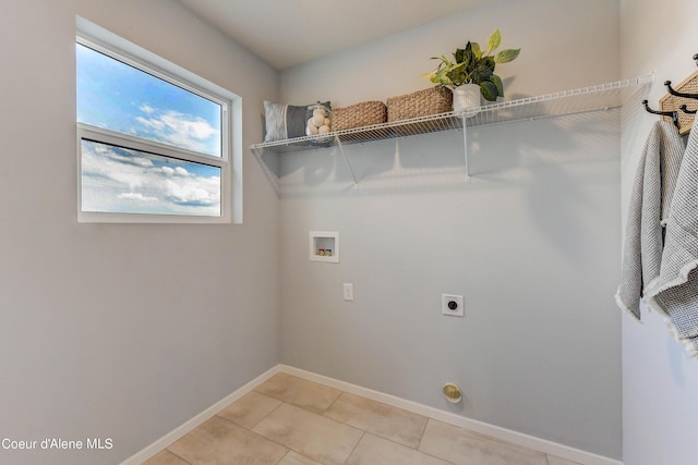 355 E Burdock Loop, Hayden, ID 83835 - laundry room with baseboards, washer hookup, light tile patterned floors, laundry area, and electric dryer hookup