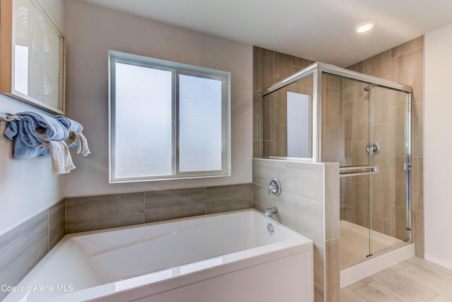 355 E Burdock Loop, Hayden, ID 83835 - bathroom with a bath and a shower stall