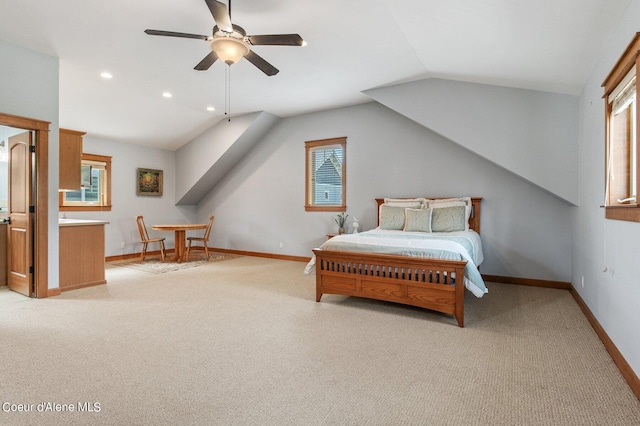 bedroom featuring baseboards, recessed lighting, ceiling fan, vaulted ceiling, and light colored carpet