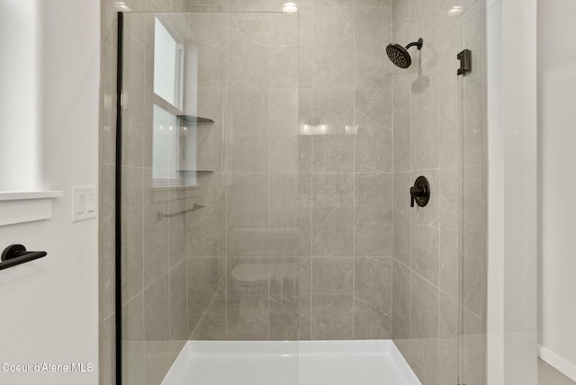 bathroom featuring a stall shower