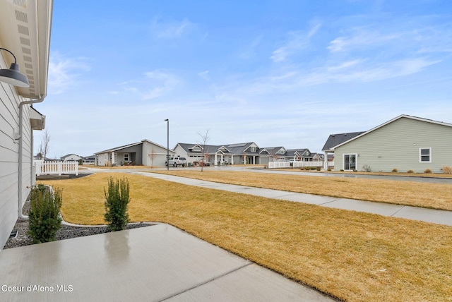 view of yard featuring a residential view