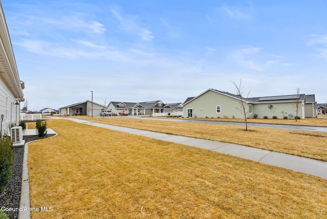 view of yard featuring a residential view