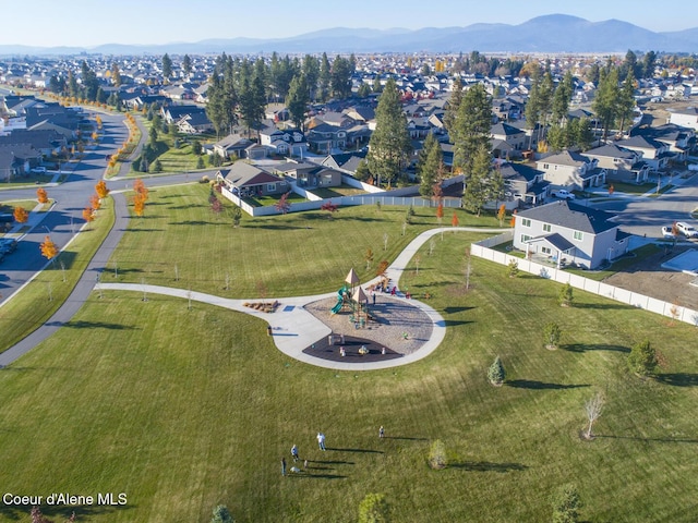 drone / aerial view with a residential view and a mountain view