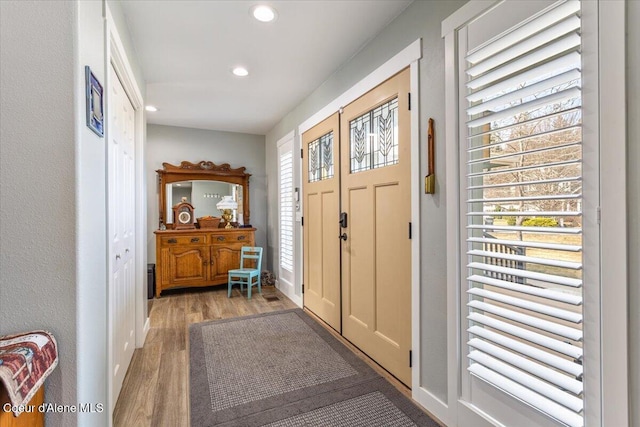 entrance foyer featuring recessed lighting and wood finished floors