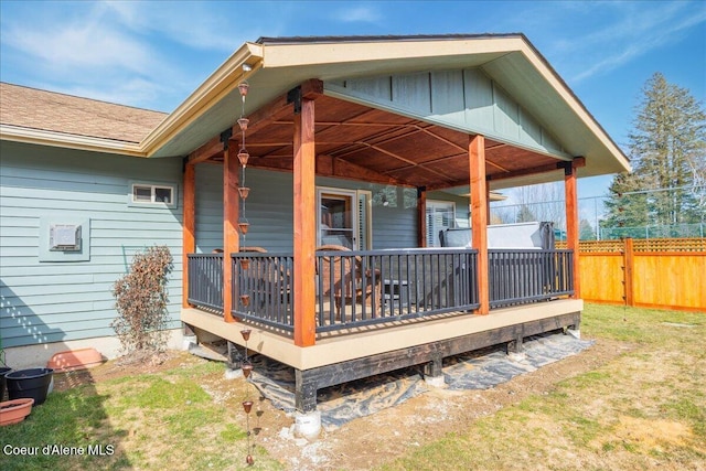 deck with fence and a lawn