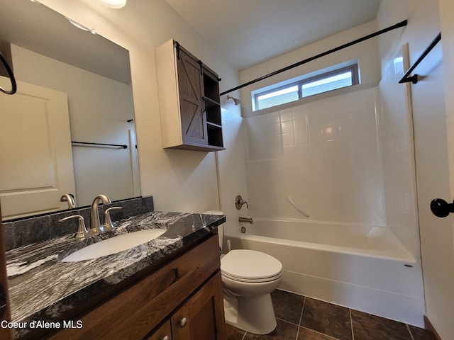 bathroom featuring vanity, toilet, tile patterned flooring, and shower / tub combination