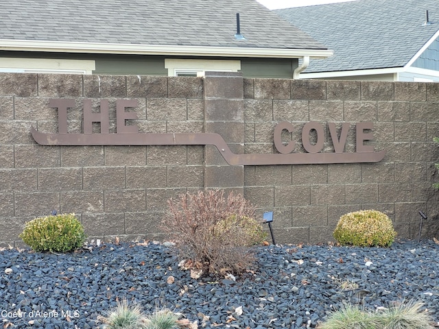 community sign with fence