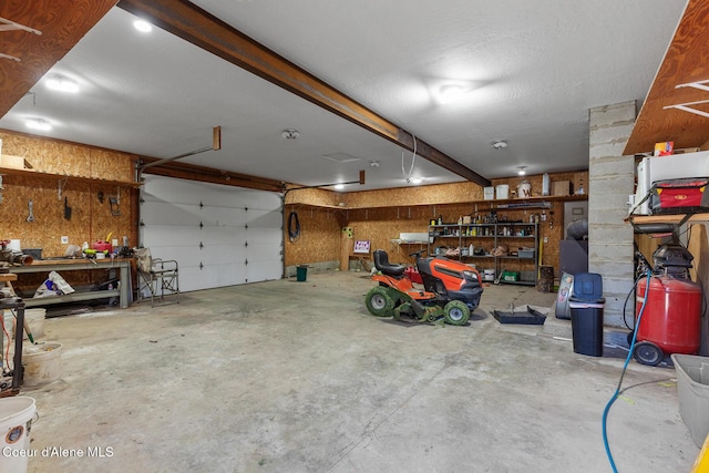 garage featuring a workshop area