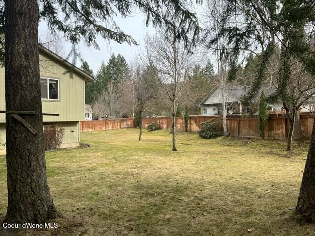 view of yard featuring fence