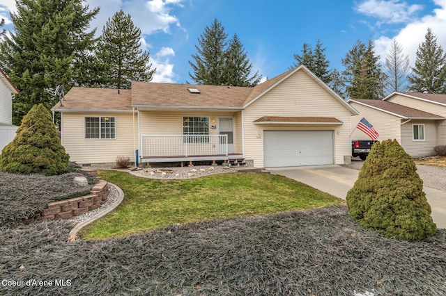 ranch-style house featuring crawl space, a garage, concrete driveway, and a front yard