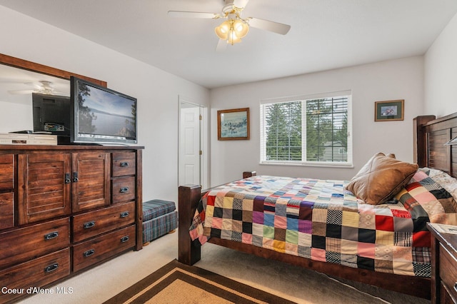 bedroom featuring a ceiling fan and carpet floors