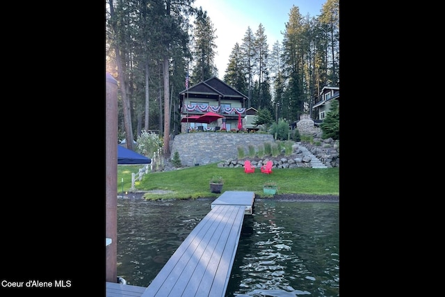 dock area featuring a yard