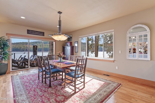 dining area featuring visible vents, recessed lighting, and wood finished floors