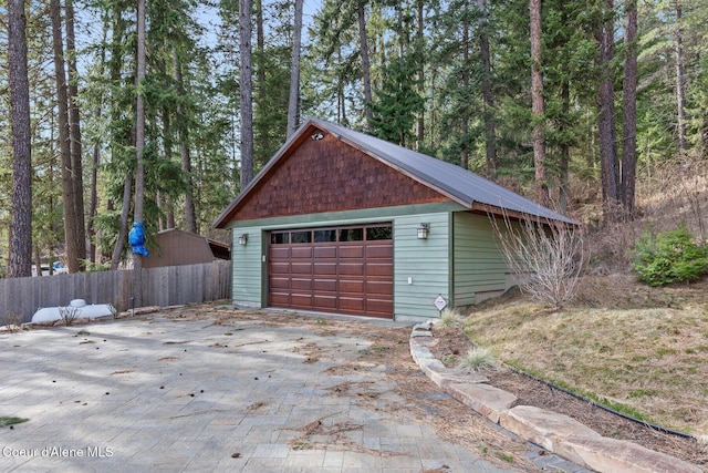 detached garage with fence