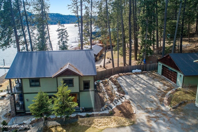 bird's eye view with a view of trees and a mountain view