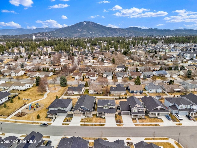 drone / aerial view with a mountain view and a residential view