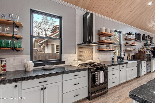 kitchen featuring open shelves, a sink, range with gas cooktop, wooden ceiling, and wall chimney range hood