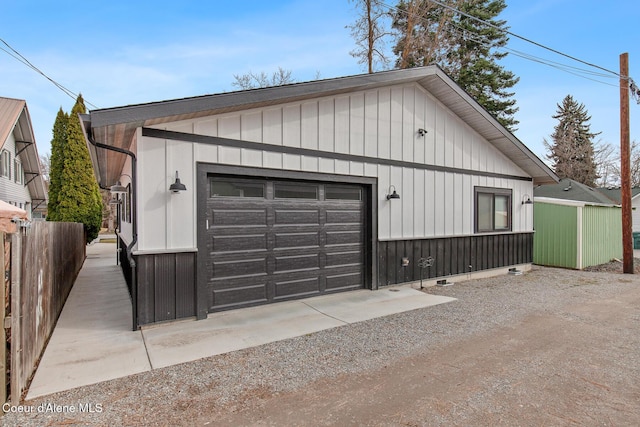 detached garage with fence