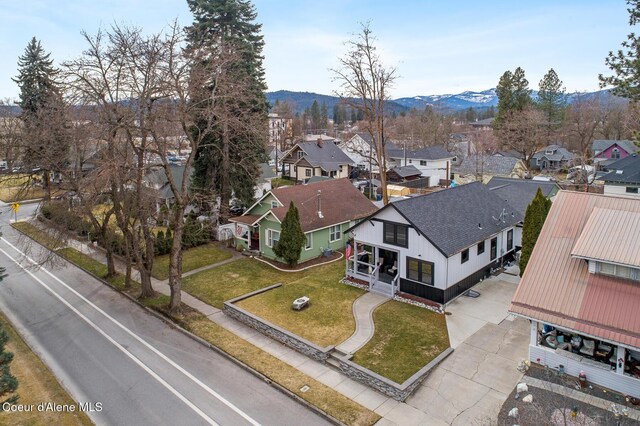 birds eye view of property featuring a residential view and a mountain view