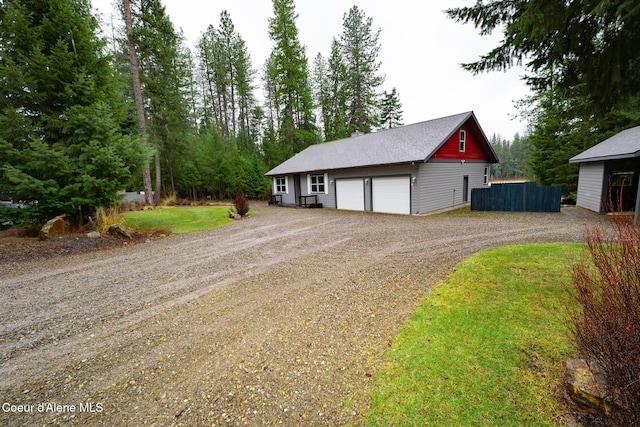 exterior space with dirt driveway