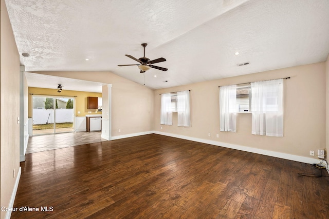 unfurnished living room featuring lofted ceiling, baseboards, wood-type flooring, and ceiling fan