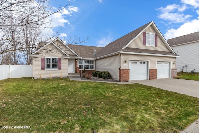 view of front of home featuring concrete driveway, fence, brick siding, and a front lawn