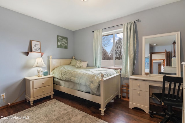 bedroom featuring dark wood-type flooring