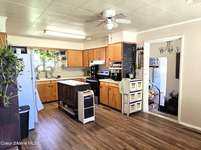 610 E Ockert St, Oldtown, ID 83822 - kitchen featuring light countertops, freestanding refrigerator, under cabinet range hood, electric stove, and a ceiling fan