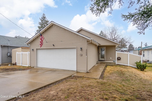 single story home featuring driveway, a front yard, a garage, and fence