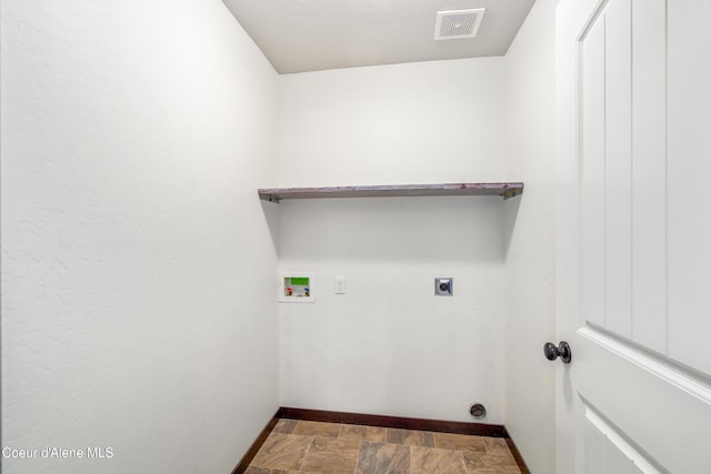 laundry room featuring visible vents, washer hookup, stone finish floor, hookup for an electric dryer, and laundry area