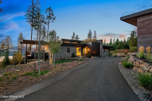 contemporary home featuring driveway