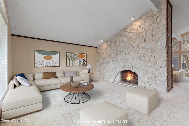 1669 E Evergreen Dr, Hayden Lake, ID 83835 - living area with carpet floors, a stone fireplace, and crown molding