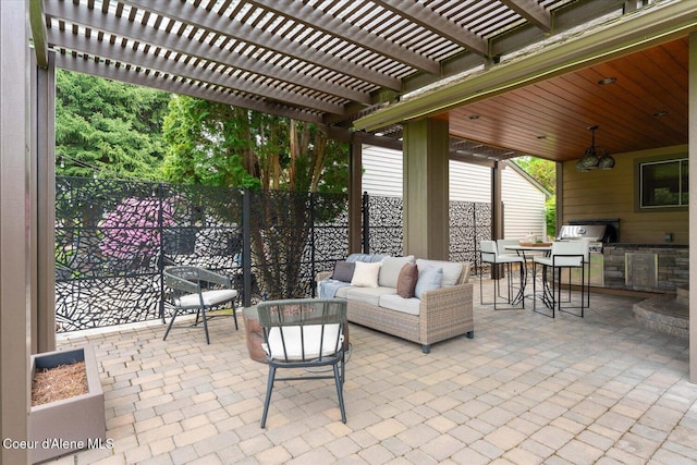 1665 E Club Ln, Hayden Lake, ID 83835 - view of patio featuring exterior kitchen, a pergola, outdoor lounge area, and outdoor dining area