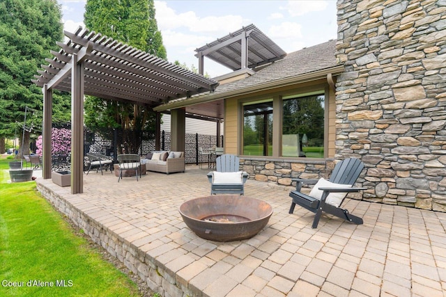 1665 E Club Ln, Hayden Lake, ID 83835 - view of patio with a pergola and an outdoor living space with a fire pit