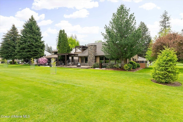 1665 E Club Ln, Hayden Lake, ID 83835 - view of grassy yard with a patio area