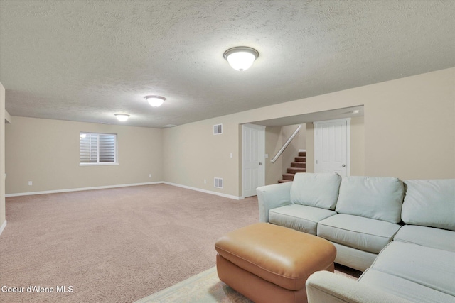 living room featuring light carpet, visible vents, stairs, and baseboards