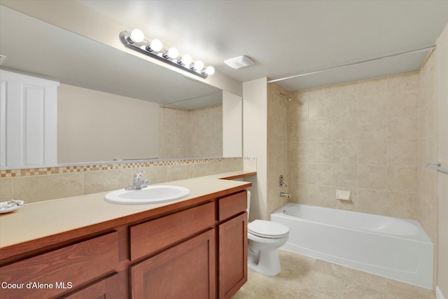 full bathroom with vanity, tile patterned flooring, bathing tub / shower combination, toilet, and tasteful backsplash