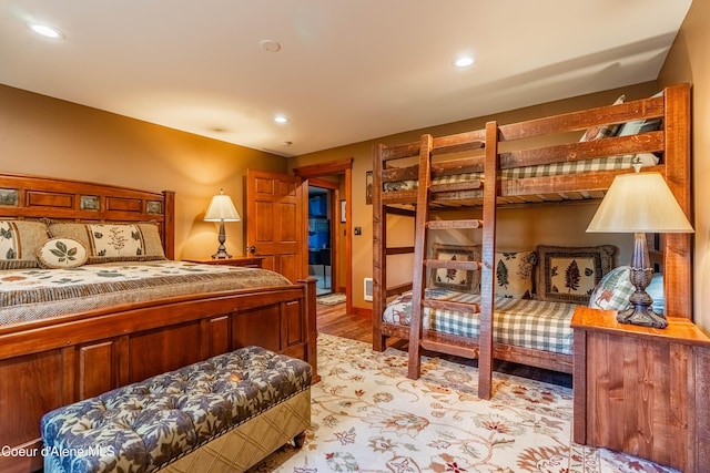 bedroom featuring recessed lighting