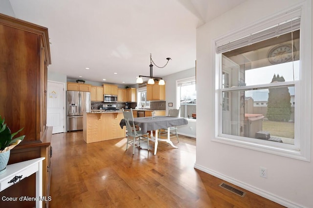 dining space with recessed lighting, visible vents, baseboards, and dark wood-style floors