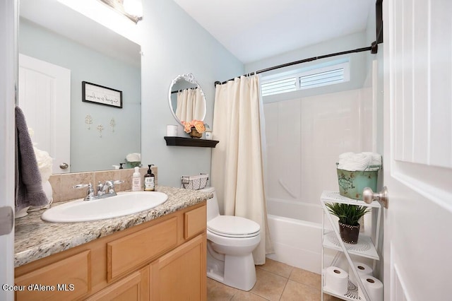 full bath featuring tile patterned floors, shower / bathtub combination with curtain, toilet, and vanity