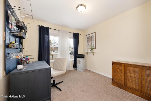 home office with baseboards and carpet