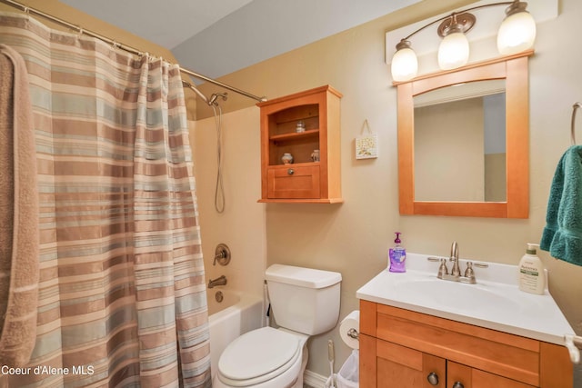 bathroom with shower / bath combination with curtain, toilet, and vanity