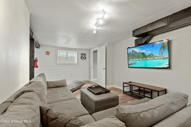 living room with wood finished floors and baseboards