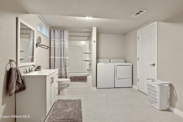 full bathroom featuring visible vents, toilet, independent washer and dryer, shower / tub combo, and vanity