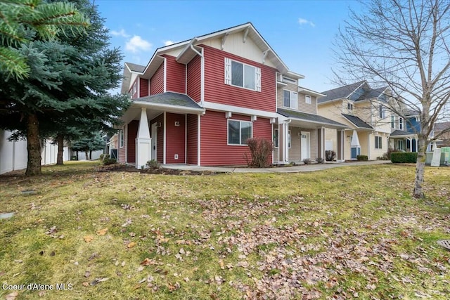 view of front of home with a front lawn