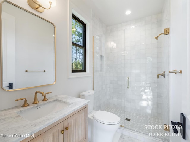 full bathroom featuring vanity, toilet, a stall shower, and marble finish floor