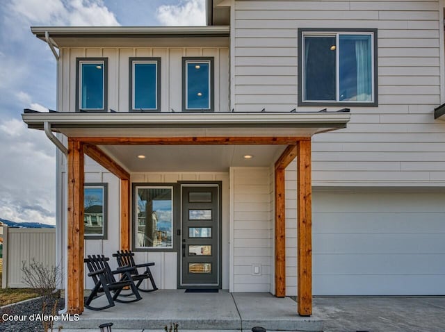 property entrance with covered porch