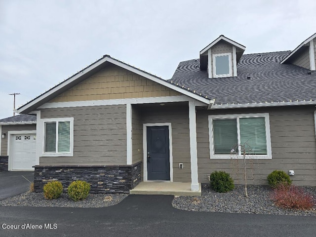 view of front of house with stone siding