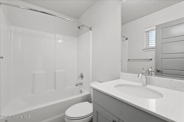 full bathroom with shower / bathing tub combination, toilet, and vanity