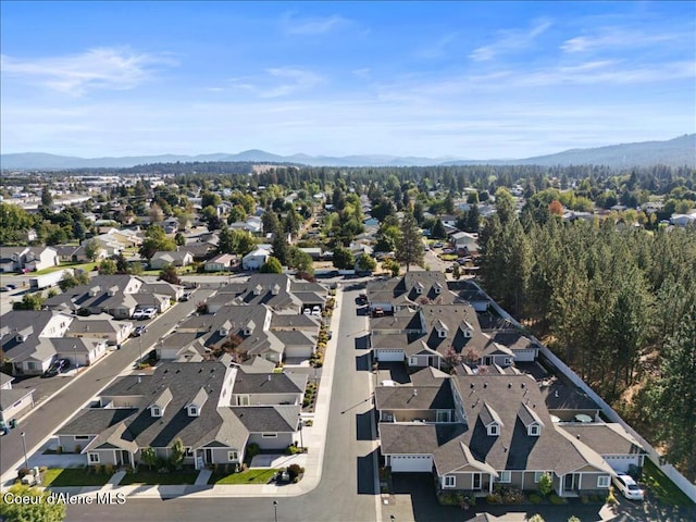 aerial view featuring a mountain view and a residential view